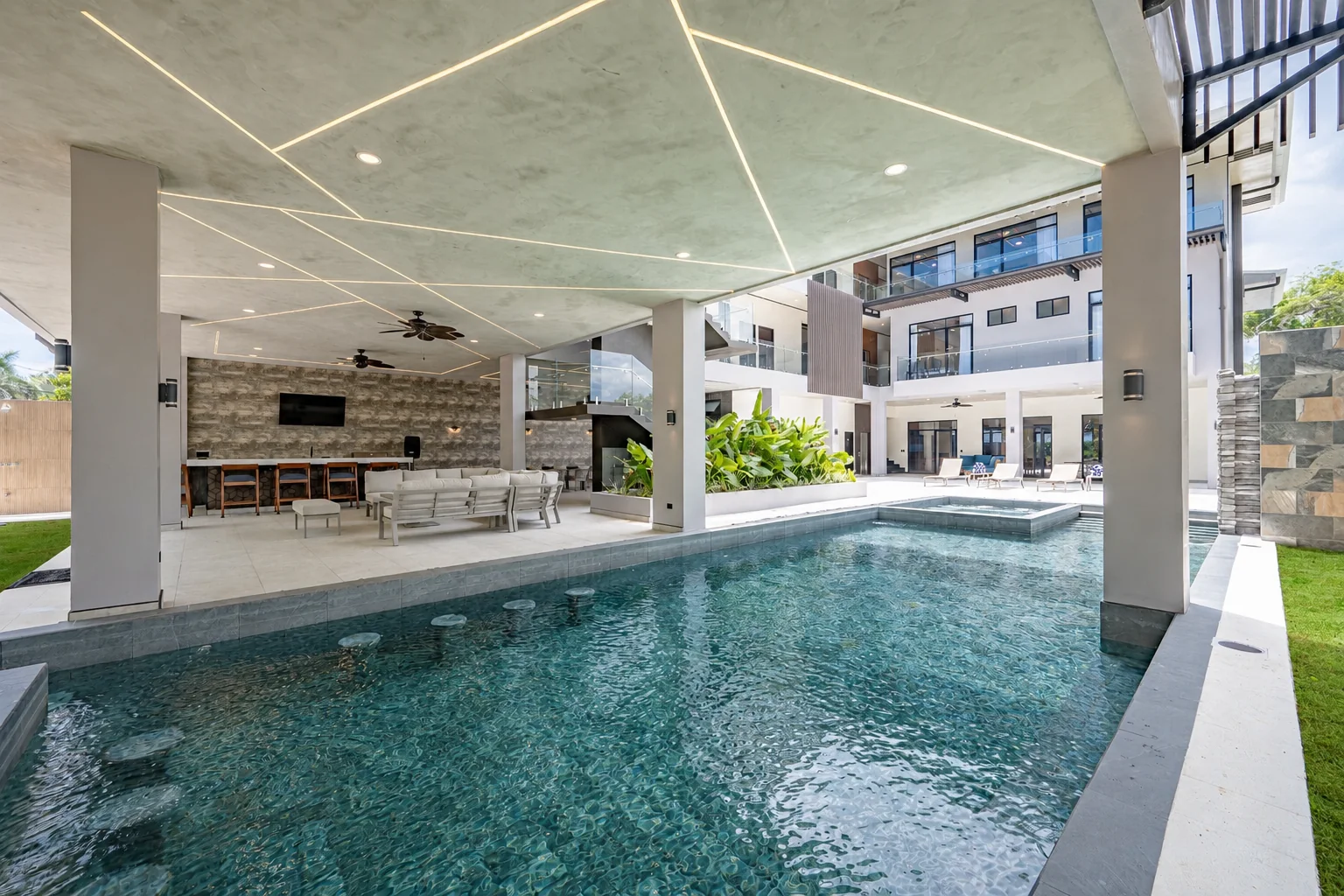 Courtyard pool beneath the open-air lounge deck