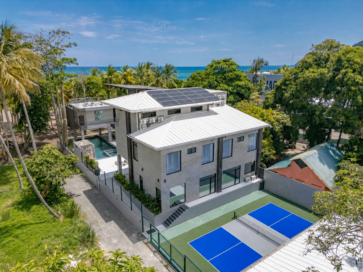 Aerial of the private pickleball court beside the villa