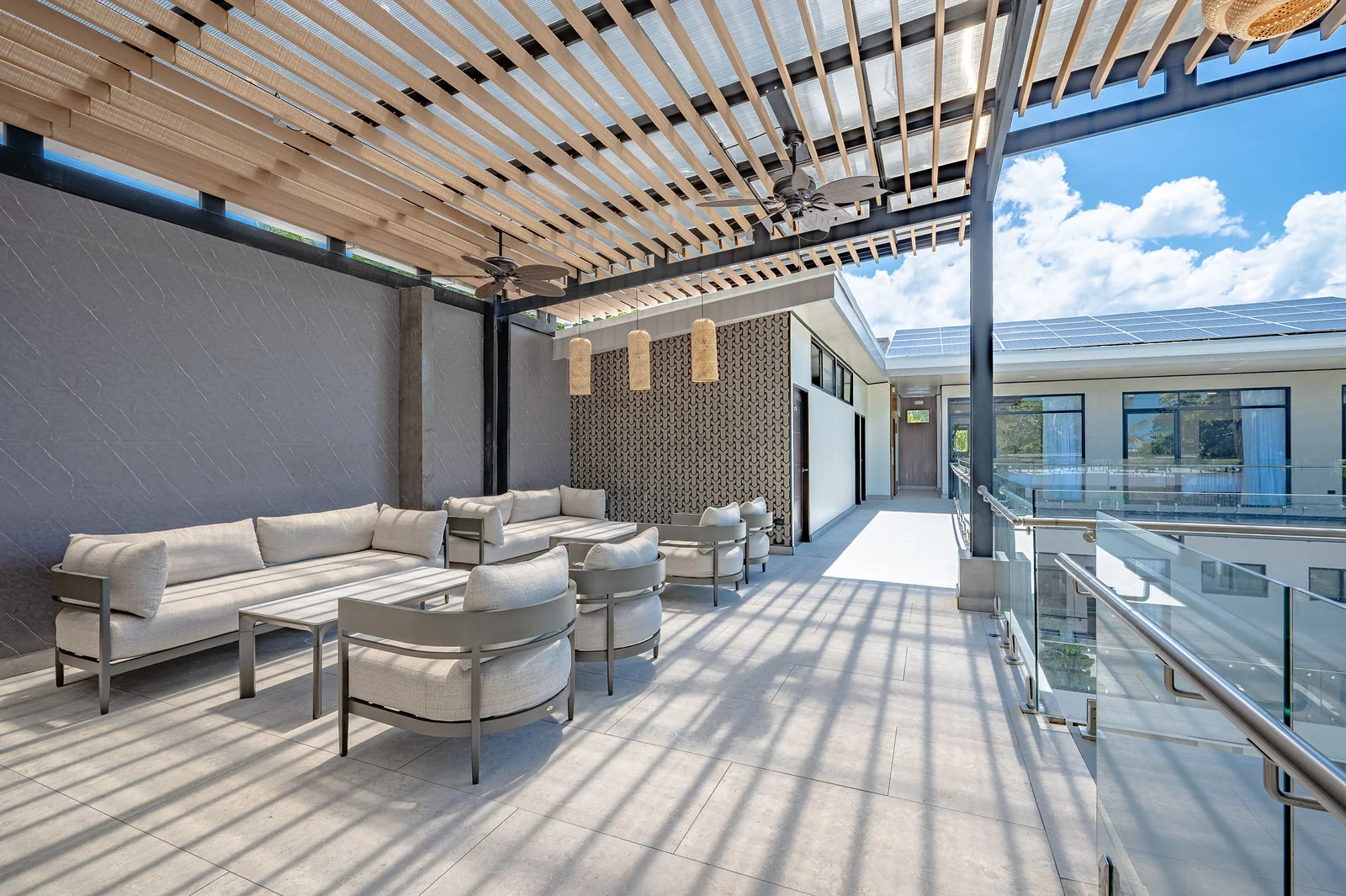 Rooftop lounge bar beneath the slatted pergola
