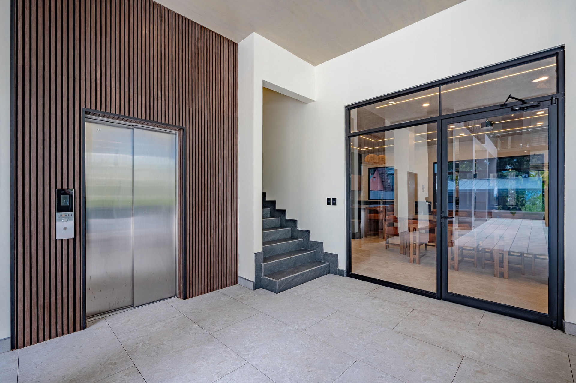 Elevator at the entrance of Casa Las Palmas serving every floor