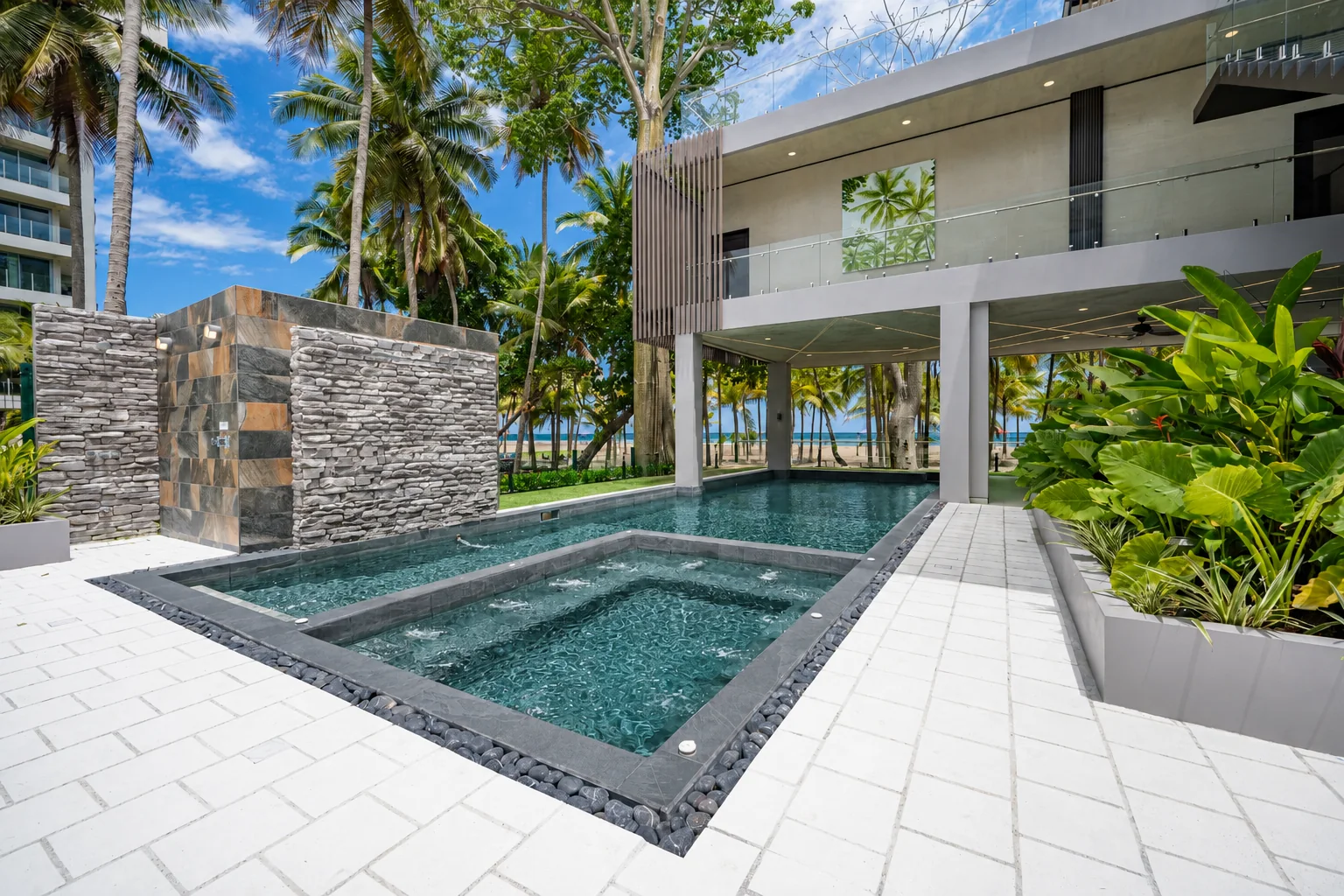 Spa and pool deck with tropical planting