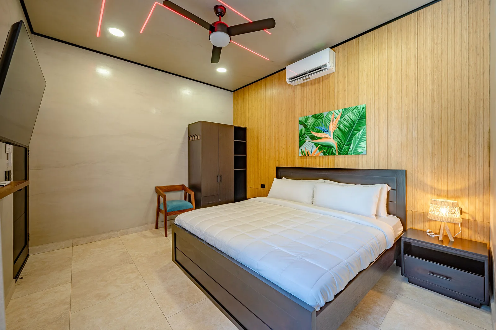 King bedroom with warm bedside lighting